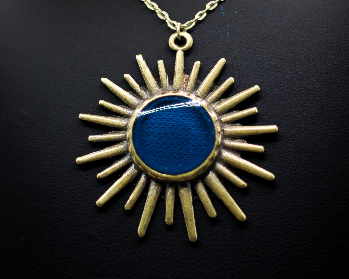 Antique Bronze Sun Pendant Necklace Featuring Fabric From Authenticated Historical Clothing