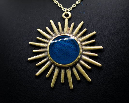 Antique Bronze Sun Pendant Necklace Featuring Fabric From Authenticated Historical Clothing